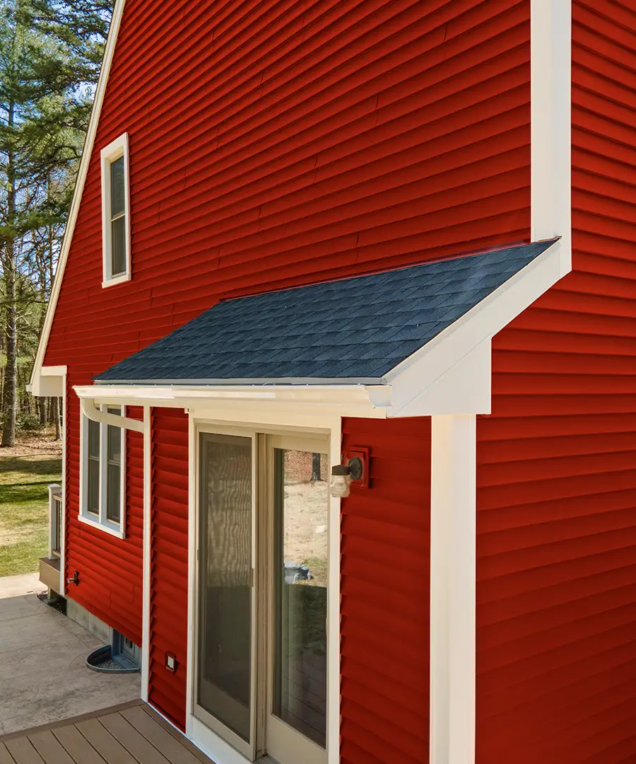 red siding on a house